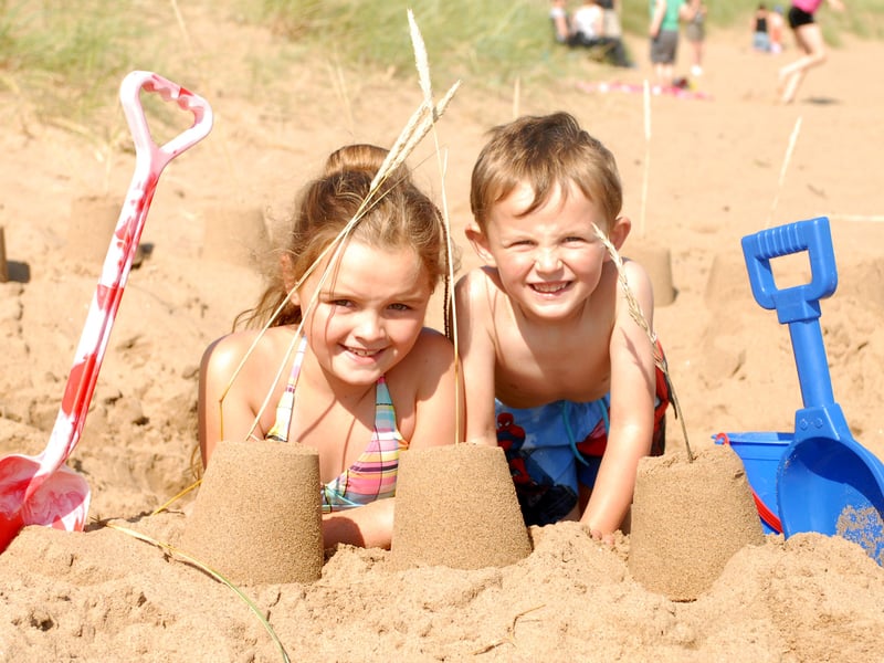 The sun was out for the August Bank Holiday in 2013. Ellie Shortland and brother Alfie Birks made the most of it with a day of fun in the sand.