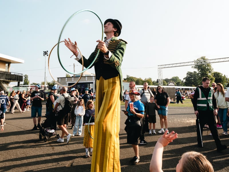 This circus performer entertained the crowds during the festival on Saturday.
