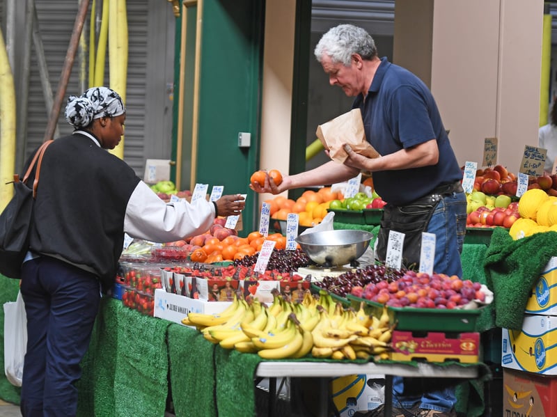 A busy fruit and veg stall 