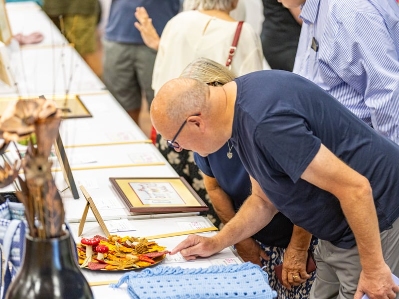 Examining the exhibits at Purbrook Horticultural Society Annual Summer Show Picture: Marcin Jedrysiak