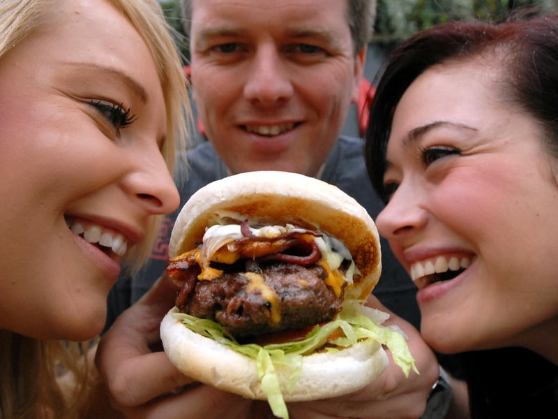 Louise Banks, John Shaw and Laura Diamond were enjoying a burger at The Mile in 2009.
