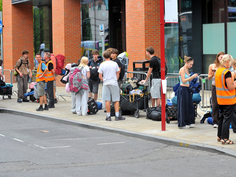 Queuing fans ready to set off on the shuttle bus 