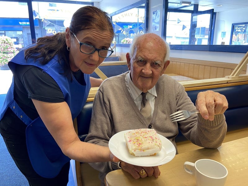 Billy Matthews enjoyed a slice of cake at Valentes Cafe in 2020, especially as it was served by his daughter Susan Dugan.