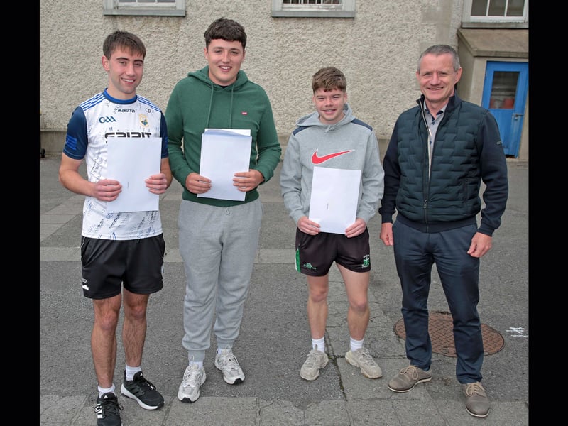 Mr Gacquin with students Conor Doherty, David Quinn, James Hagan