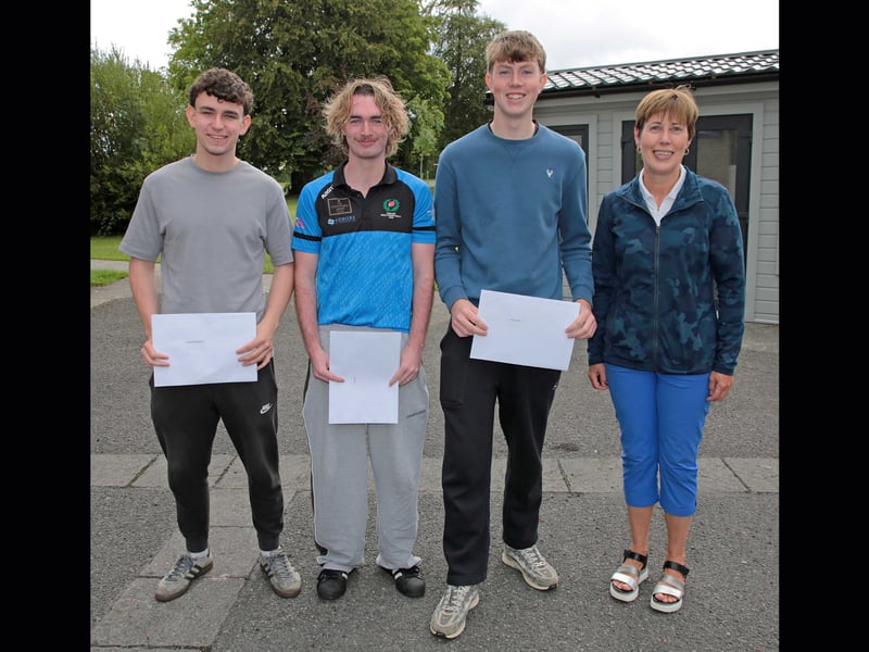 Year Head Regina Laffan with students Graham Reilly, Danny Kelly and Eoghan Kiernan