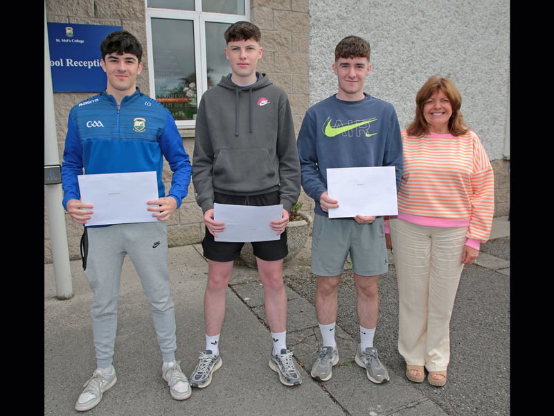 Deputy Mrs R Dolan with students Liam O'Gorman, Geordan Toher, and Mark Cooney
