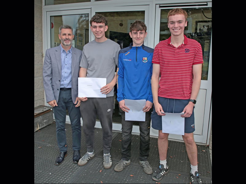 Principal Malachy Flanagan with students Graham Reilly, Diarmuid O'Brien, and Jack Finnegan