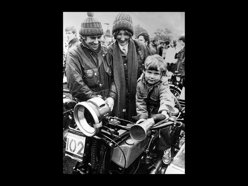 Four-year-old Ian Cheesewright gets to grips with a 1922 Ariel motorcycle belonging to John Brett and his wife Susan at the Sandwell Historic Vehicle parade in May 1978.