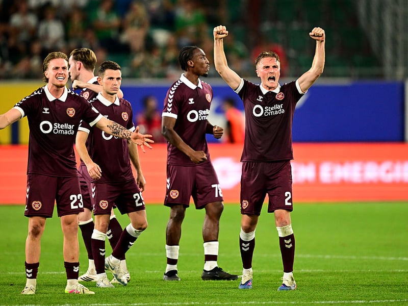 Christian Borchgrevink of Heart of Midlothian reacts with teammates during the penalty shootout 
