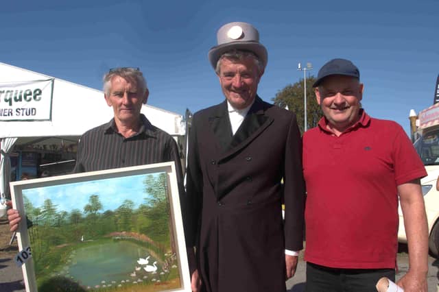 Michael Lonergan of Castlejohn near Ahenny, Iverk Show Committee member Walter Power from Ninemilehouse dressed in Victorian costume and Richie Rohan from Castlejohn enjoying the show