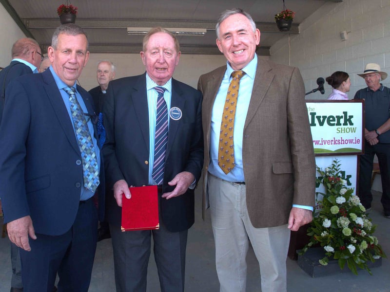 Iverk Show Committee Chairman John Flynn, Walter (Wattie) Walsh, who was presented with a gift to mark his work with the show, and Carrick-on-Suir solicitor Michael O'Brien. Walter has been involved with the show for 70 years. He served as Iverk Show Committee chairman for 25 years and president for the last three years. 