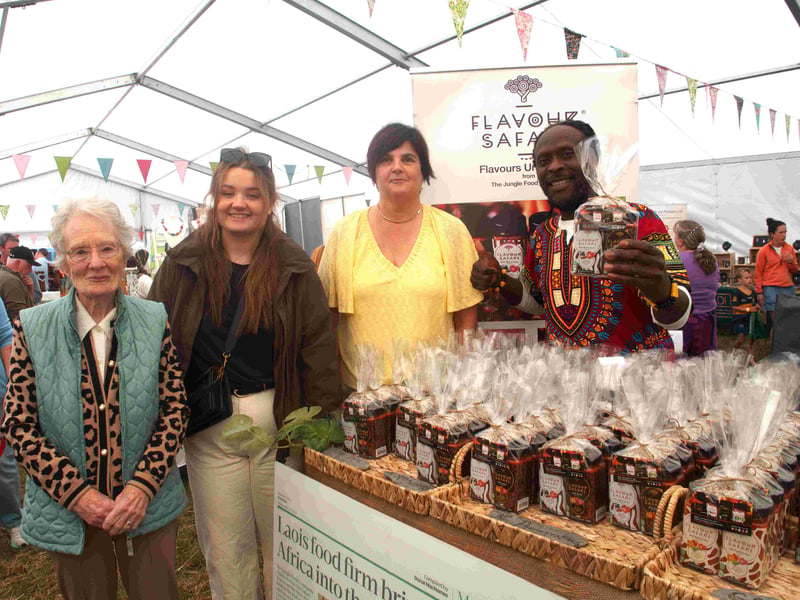 Kathleen, Lucy and Sandra Skehan from Rathgormack with Michael Onalimi of Flavour Safari in the trade stands marquee at the Iverk Show 