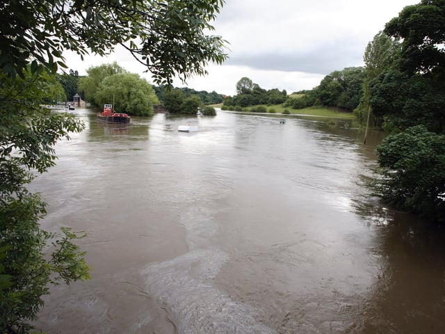 26th June 2007............River boat drama on the River Don at Sprotbrough, Doncaster after the Wyre Lady broke loose from her moorings getting stuck under a gas pipe during the extreme flooding.