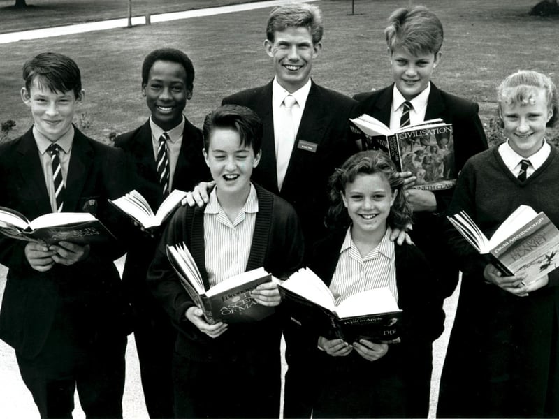 Pupils from Ounsdale High School in Wombourne and Regis School in Tettenhall received book vouchers from Sainsbury's in July 1989 as part of the supermarket's links between industry and education. Wolverhampton deputy manager Neil Milton presented the vouchers to Paul Mason, Collis Bailey, Julie Dodd, Helen Sargent, Richard Lee and Julia Scarth. Do you recognise any of the pupils, or remember what your favourite school book was?