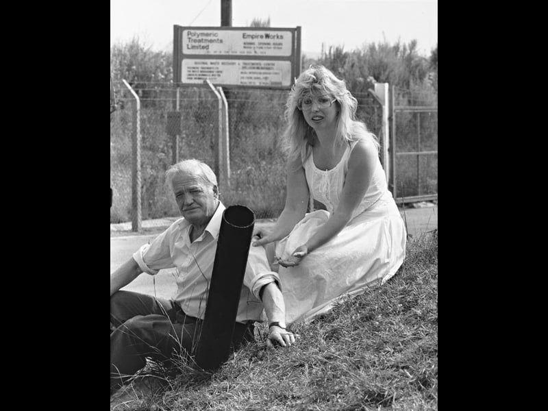 Eric Ward and Nita-Marie Farmer are pictured after a crane smashed through the metal gates at Leigh Interests' waste disposal plant on Stubbers Green Road, Aldridge, in July 1989. The incident happened as protesters were attempting to blockade the site, narrowly missing those involved. Do you remember the protests at Stubbers Green Road, or the controversy surrounding the waste plant?