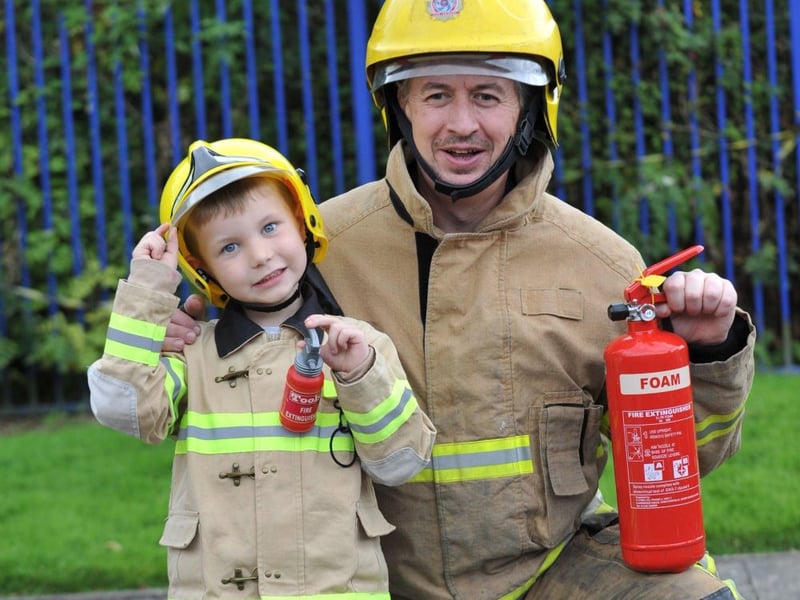 Cameron Spoors was ready to spring into action with a mini fire extinguisher 9 years ago.
Here he is with fireman Brian Lazzari at the South Shields Community Fire Station open day.