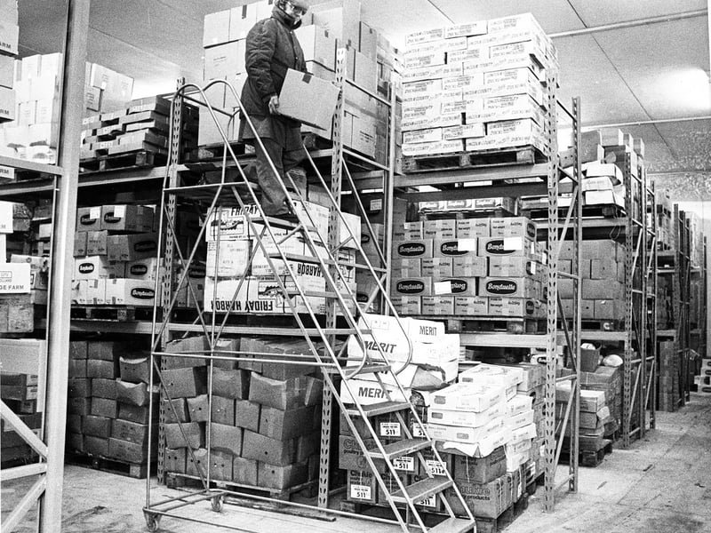 Wrapped up against the cold, Stan Evans carries a carton from the towering cold store at Everfresh Frozen Foods International in Tipton in March 1989. With boxes stacked high on racking, the company had just doubled its storage capacity as it continued to expand. Do you remember Everfresh, or working in one of these vast frozen warehouses?