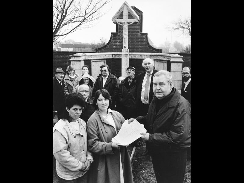 Sandra Davies and Julie Ruston hand over a petition to Councillor Jim Gavin during a campaign to save Moxley War Memorial in December 1989. Walsall South MP Bruce George and the Mayor and Mayoress, Councillors Ray and Doreen Farrell, were among those backing the protesters. Do you remember the campaign to save the memorial, or what it meant to local people?