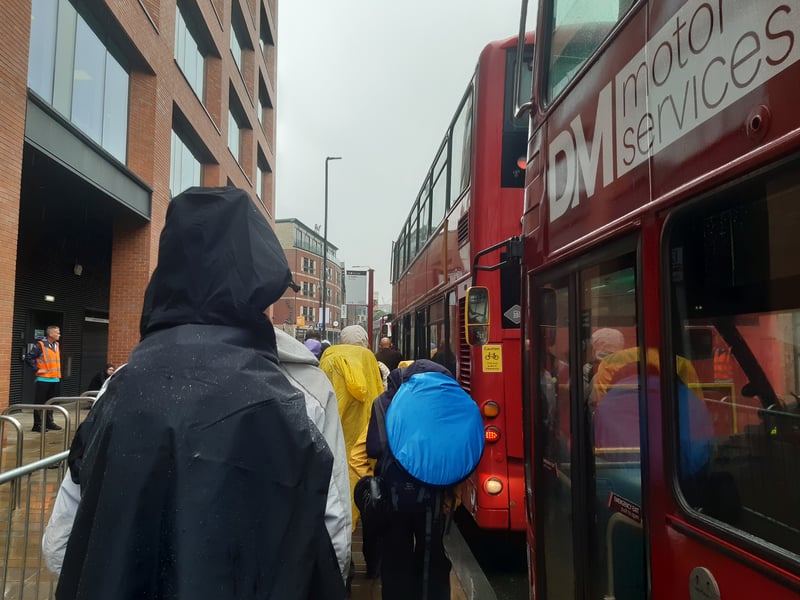 Waiting in the rain for the bus to Leeds Festival