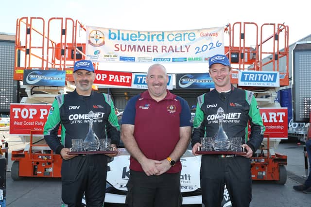 Galway Motor Club president Padraig Murray with with winning crew of Keith Moriarty and Josh Moffett.