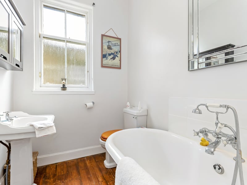 There is also this stylish family bathroom with shower over the bath, while a separate shower room on the ground floor adds further convenience for family life and guests.
