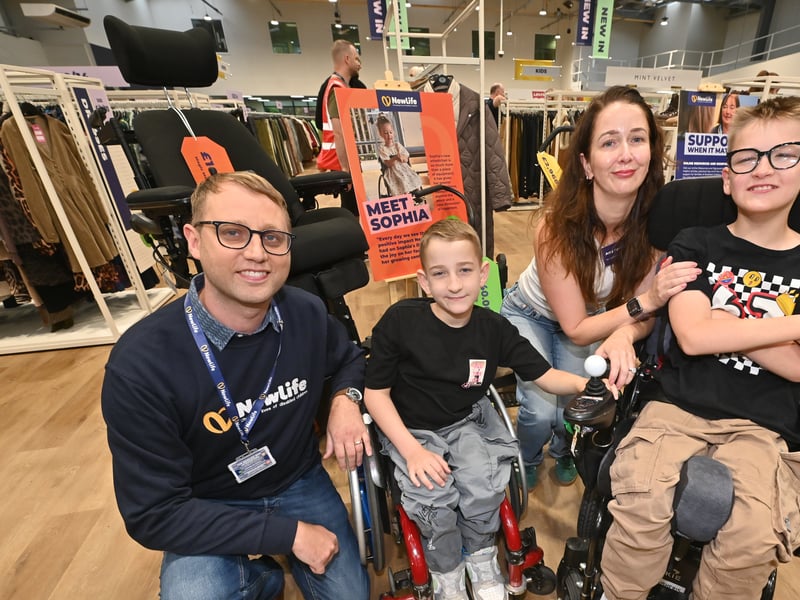Stephen Morgan (Director of Governance) meets a family the charity has supported. He is pictured with Amy Sproston Bobby and Leo.