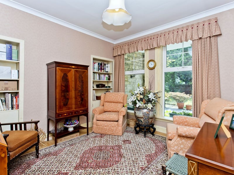 Completing the collection of reception rooms is an intimate snug/sitting room, featuring fitted shelving. Together, these rooms provide impressive versatility for family life, home working, entertaining, hobbies, and quieter moments.