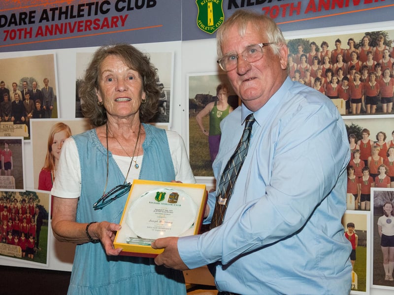 Michael Barber (Secretary) presenting a plaque to Sheelagh Morrissey daughter of the late Joe Morrissey and founder member of Kildare Athletic Club