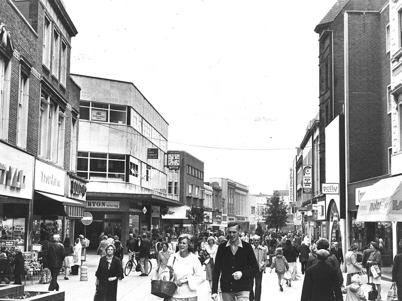 Dudley Street was bustling with shoppers in 1975 as people went about their everyday business. The photograph captures the fashions, shopfronts and general hustle and bustle of the street more than 50 years ago. How many familiar faces, shops or details can you spot, and do you remember shopping along Dudley Street?