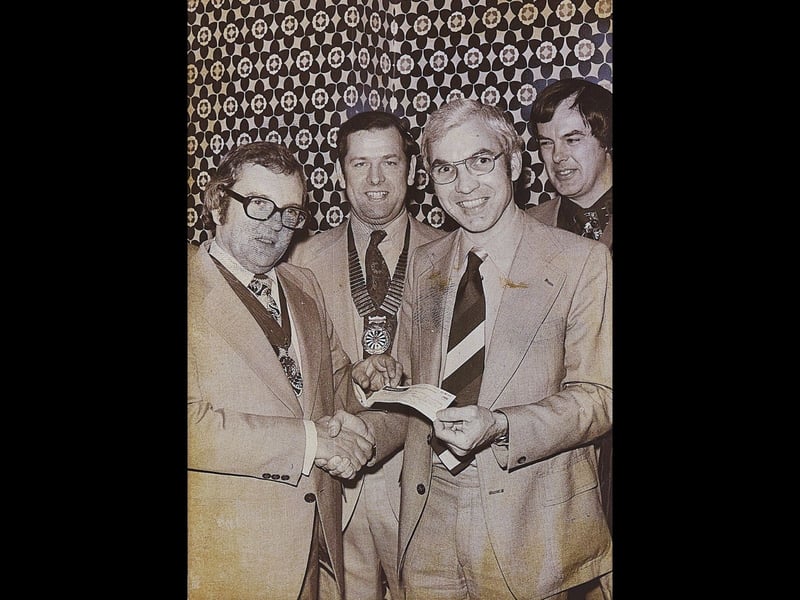 Walsall Round Table raised money for two new machines at Queen Elizabeth Hospital in Birmingham to support the treatment of leukaemia. Dr John Stewart, right, is pictured receiving the cheque from John Browne, with David Webb in the centre, at the Elms Hotel in Aldridge on November 21, 1975. And look at that wallpaper in the background – a perfect reminder of 1970s interiors! Do you remember wallpaper like this, or fundraising events held at the Elms Hotel?
