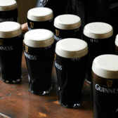 Pints of Guinness lined up