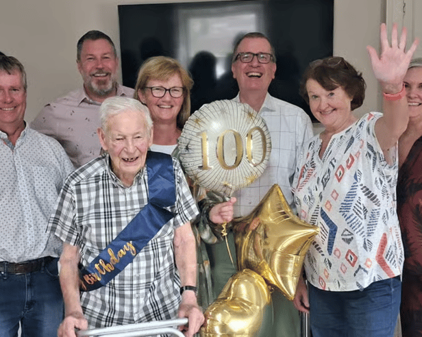 Bob Savage with his family at his 100th birthday celebration. From left, his son Andrew, Doug Drummond, Tanya Barry, his son Christopher, Ute Doerge-Baischew and Melanie Griffith