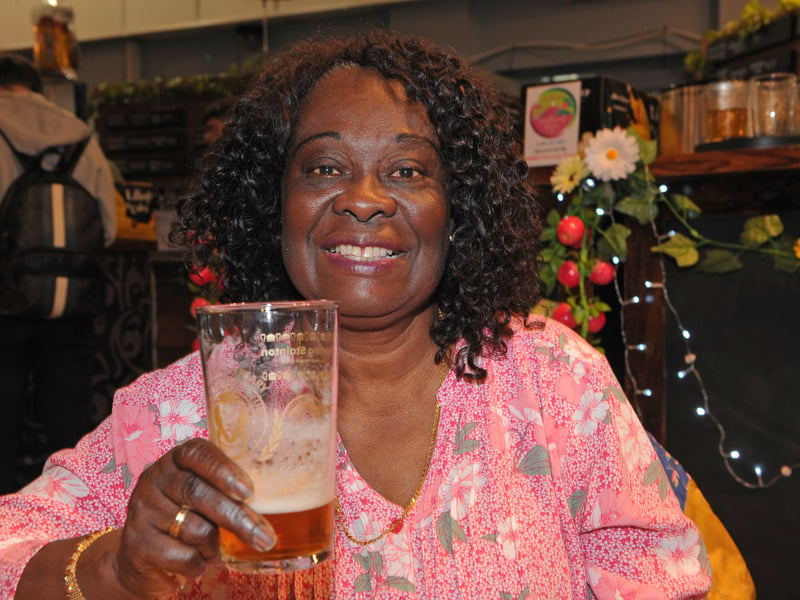 Philomena Amuesi enjoys a pint 