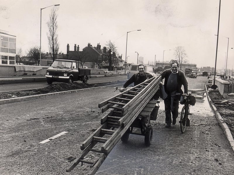 Window cleaners look for an alternative shortcut in West Bromwich in February 1975 after planners warned pedestrians against using the unfinished All Saints link road as a footpath. The route had become a popular shortcut before the road opened, but officials feared pedestrians could step into the path of vehicles. Do you remember using shortcuts like this around West Bromwich?