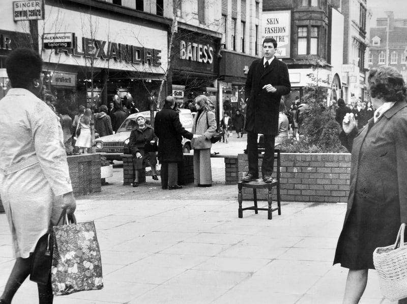 A Mormon preacher delivers his message from a rickety chair in Dudley Street, Wolverhampton, in February 1975. The young man was among a group of American missionaries who regularly gathered in the town centre on Saturday afternoons to speak to shoppers and passers-by. Do you remember seeing preachers like this in Dudley Street?