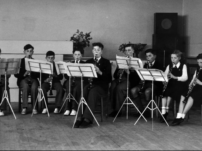 "School orchestra" is written on the back of this print which was in our Shrewsbury office. The only other information is a partial stamp reading "for Secretary For Education." It is likely to be school children from a Shropshire school and, as you can see, they are playing the clarinet. Our guess at the date is early 1950s or maybe late 1940s.
