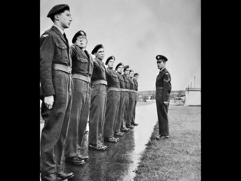 RAF recruits of 5 Flight, Intake No. 43, are pictured on parade at RAF Bridgnorth at Stanmore on December 11, 1962, as they began eight weeks of training. Corporal W. Swan is seen checking the turnout of the young recruits in their uniforms. This was the final intake at the recruit training school before the station closed. The photograph was later reprinted in 1973. Do you remember RAF Bridgnorth at Stanmore, or know anyone who trained there?