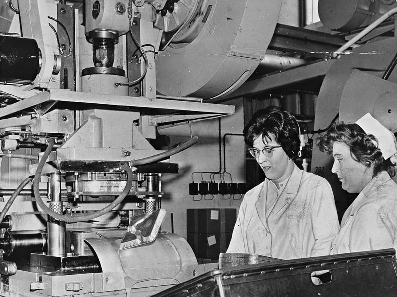 Two women watch the action in the press shop at Star Aluminium Ltd., Bridgnorth, in May 1962, as a standard dinner tray is stamped from a sheet of foil. It offers a glimpse inside a local workplace and the manufacturing processes of the time. Do you remember Star Aluminium or anyone who worked there? Can you imagine making these trays day after day?