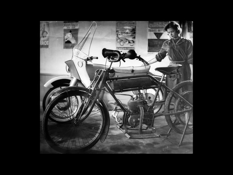 This picture from a Rugeley motorcycle showroom in 1959 gave some idea of how motorcycle design had progressed. In the foreground is a 1911 Calthorpe. Behind it stands a 1959 Ariel Leader.