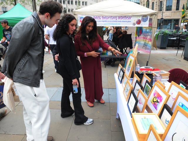 One of the stalls at the food fest to have your name in Arabic