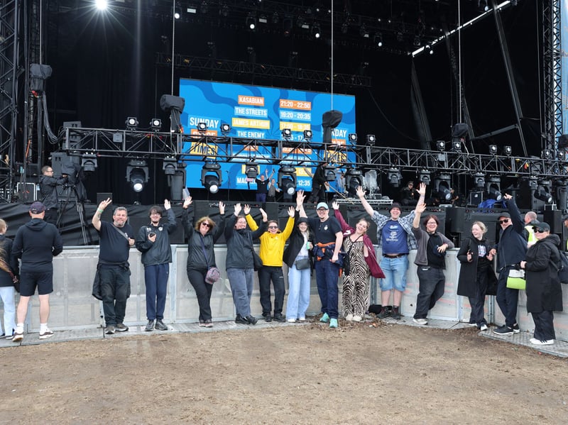 Early birds gather at the Common Stage on Day 3 ahead of the opening act Mackenzie.