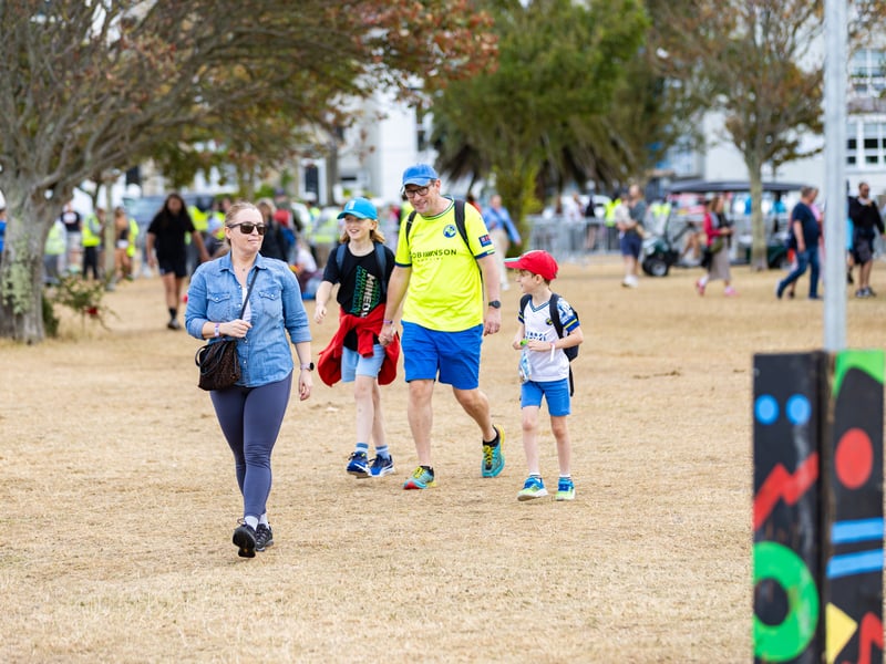 Crowds enter the festival for the final day.