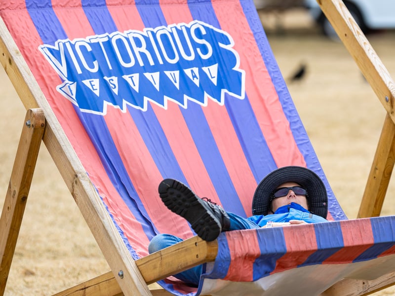 One festival-goer takes a nap before the final day's acts begin.