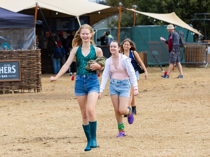 Music fans enter the festival for day 3.