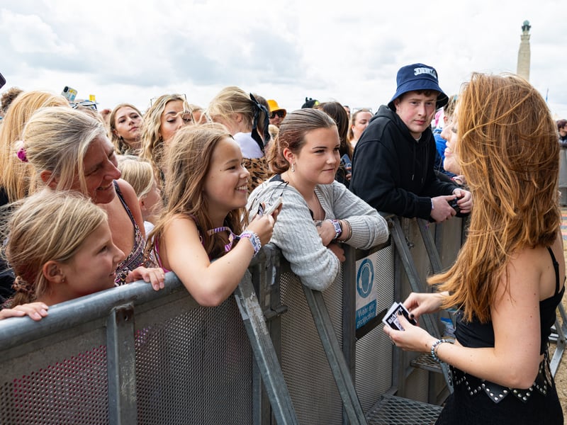 Mackenzie giving out friendship bracelets after her performance
Picture:Marcin Jedrysiak