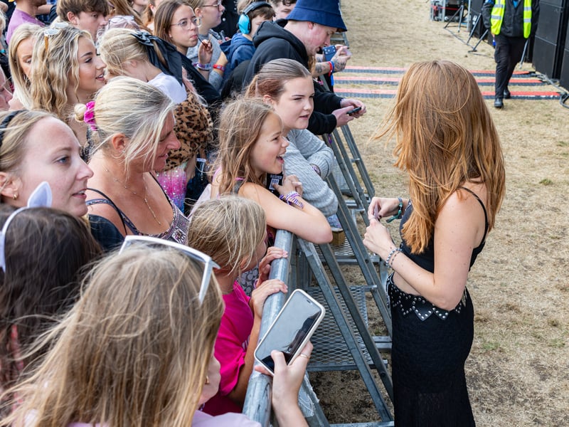Mackenzie giving out friendship bracelets after her performance
Picture:Marcin Jedrysiak