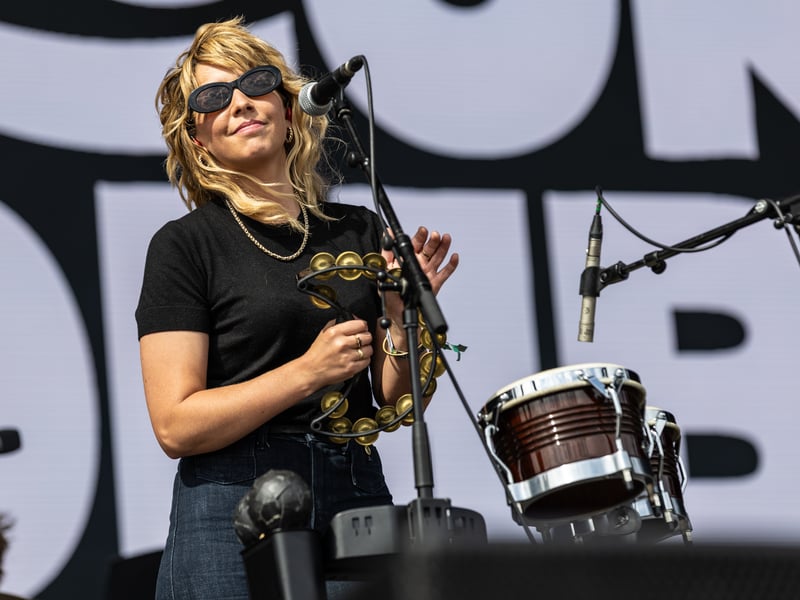 Musician performing on the Common Stage with Brooke Combe