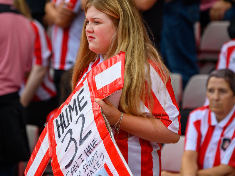 Sunderland fans in action at the Stadium of Light during the game against Fulham in the Premier League. Photo by Chris Fryatt.