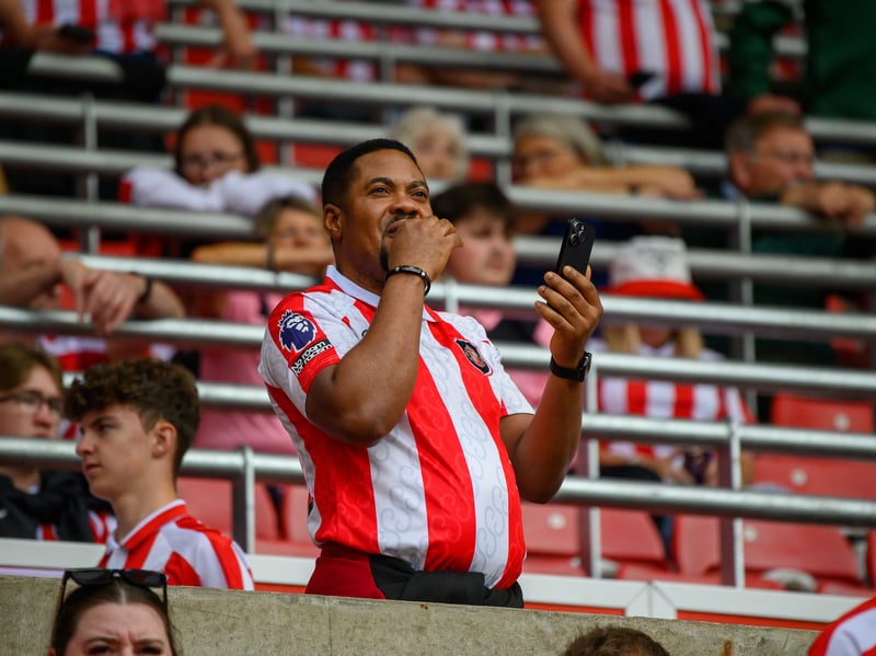 Sunderland fans in action at the Stadium of Light during the game against Fulham in the Premier League. Photo by Chris Fryatt.