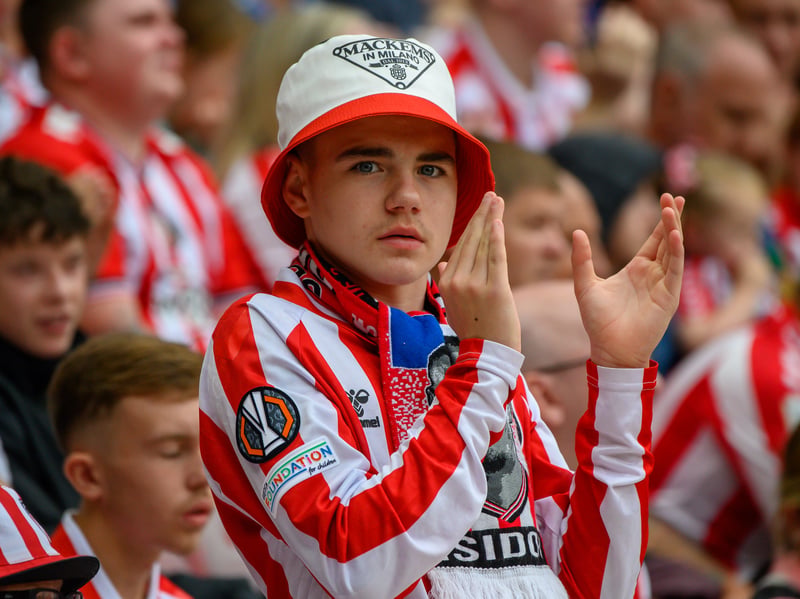 Sunderland fans in action at the Stadium of Light during the game against Fulham in the Premier League. Photo by Chris Fryatt.